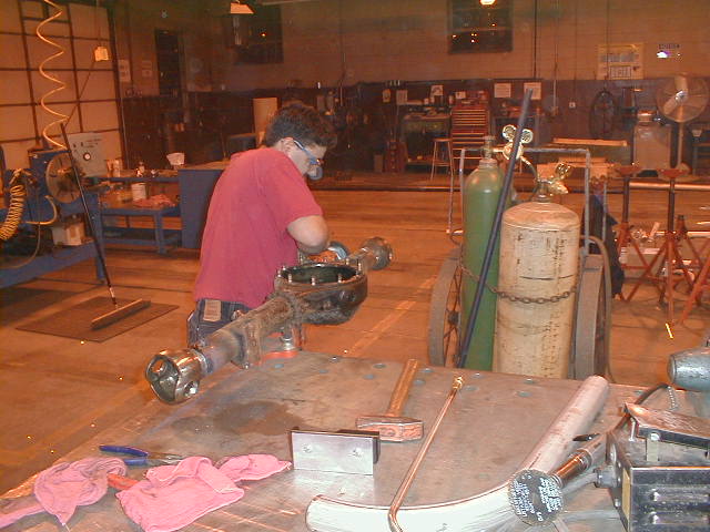 Still cutting....believe it or not, the entire turning process only took us about 2 hours, including rewelding it back together!
